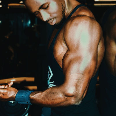 man showing of his tripceps